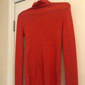 Salmon colored lightweight ribbed turtleneck